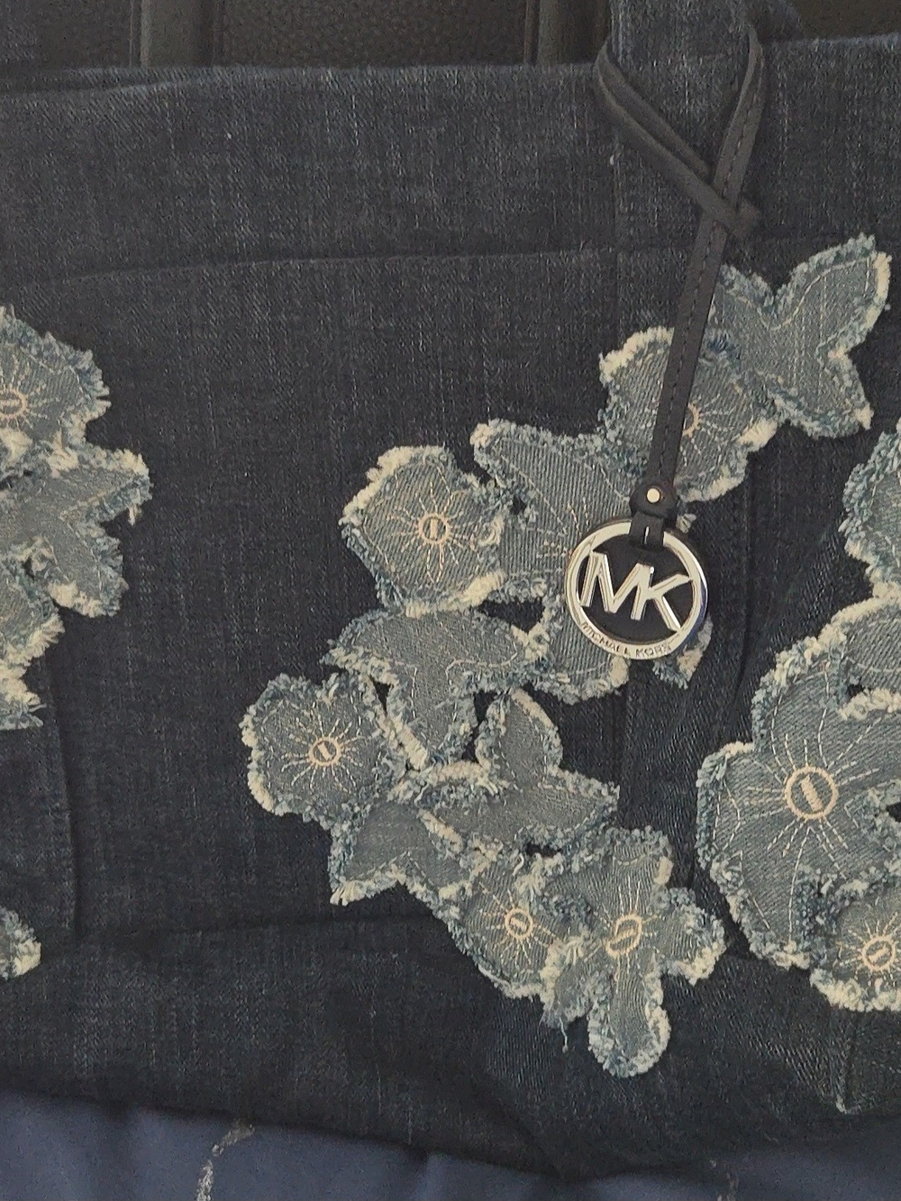 Michael Kors Black Denim Jeans with Light Blue Floral Appliqué and MK Charm